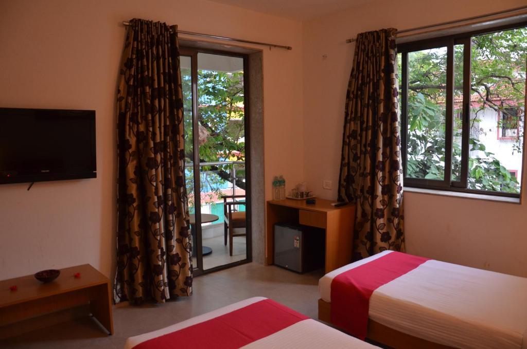 Sunkissed Plaza Hotell Calangute Rum bild