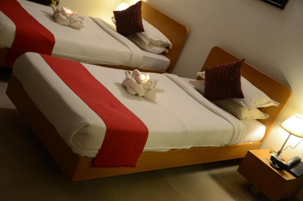 Sunkissed Plaza Hotell Calangute Rum bild