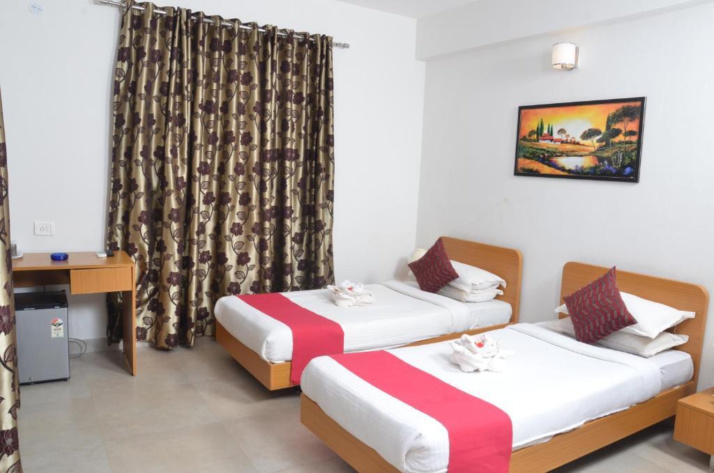 Sunkissed Plaza Hotell Calangute Rum bild